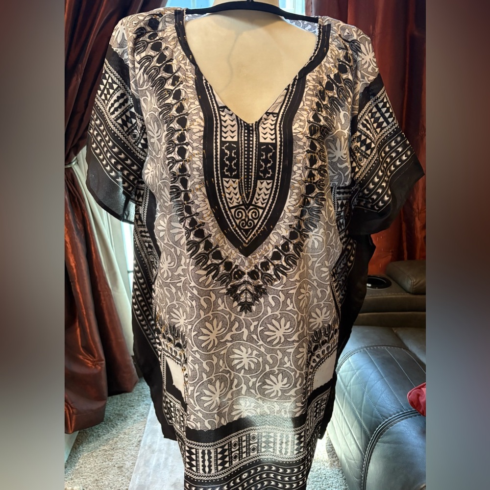 Elegant Black and White kaftan/coverup top. One size with bling accents. NWOT